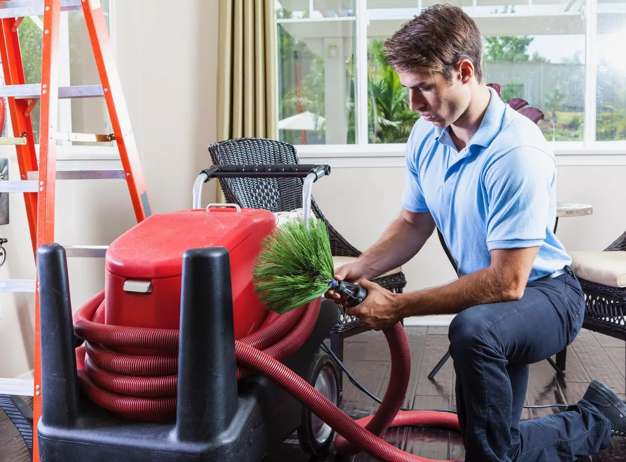 Dryer vent cleaning service removing lint buildup to prevent house fires