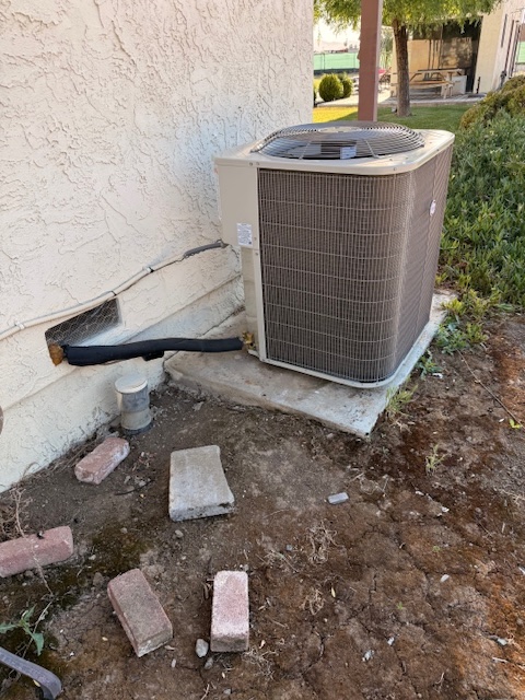 New outdoor condenser in same location after AC replacement