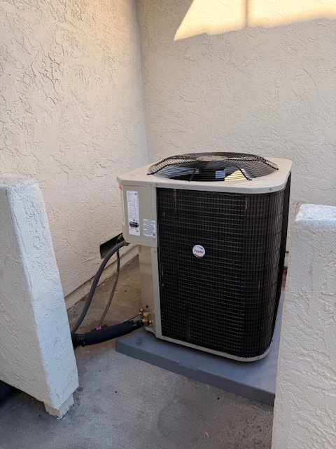 New outdoor AC condenser after replacement and setup